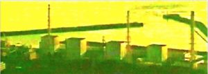 A.P. ASTRA - Cross: A coastal industrial facility with five tall chimneys or towers, positioned near the water with a breakwater structure in the background, under a yellow-green tinted light.