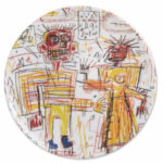 A round plate features a colorful, abstract drawing inspired by JEAN-MICHEL BASQUIAT - Self Portrait with Suzanne, showing two spiky-haired figures with scribbled text and chaotic lines in the background.